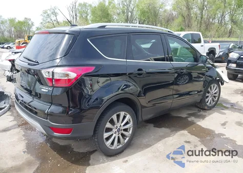 2017 Ford Escape Titanium z USA, uszkodzony, nr VIN 1FMCU9JD4HUE95391
